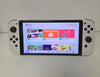 Nintendo Switch Oled white Console with 128gb memory card And 1 unboxed game