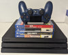Sony Playstation 4 Pro 1TB Console & 4 Games