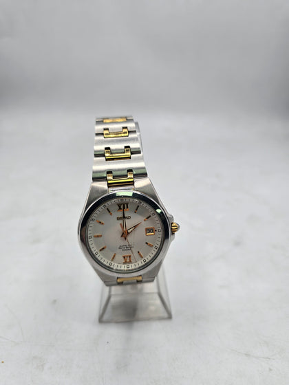 seiko kinetic watch  silver and gold metal strap