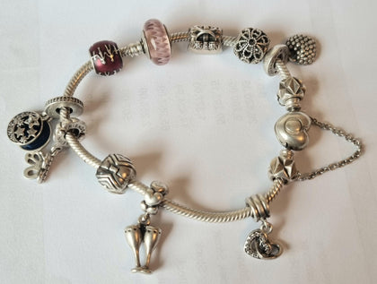 PANDORA BRACELET WITH 11 CHARMS 19cm.