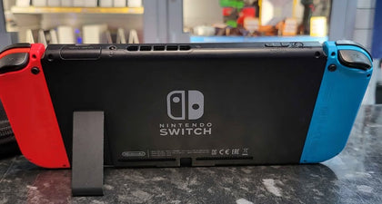 Nintendo Switch Console, 32GB + Neon Red/Blue Joy-Con