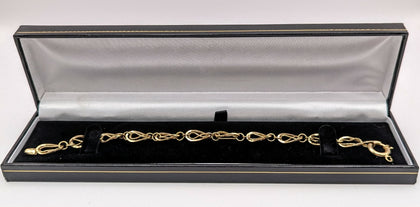 585 HALLMARKED, YELLOW GOLD, Infinity Link Bracelet, 7