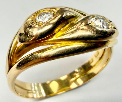 18ct gold double snake ring with diamond set heads size T