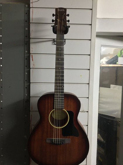 Adam black acoustic guitar