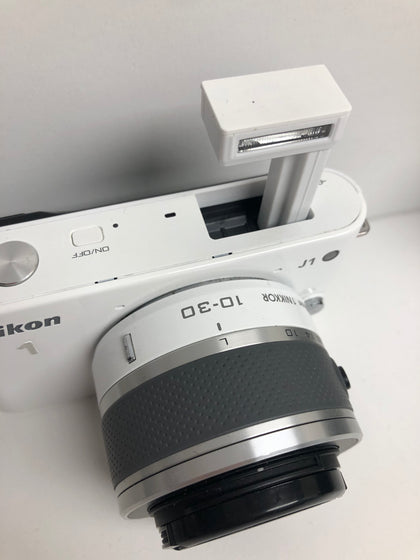 Nikon 1 J1 - Digital Camera - Mirrorless - 10.1 MP - 3x Optical Zoom 1 Nikkor VR 10-30Mm Lens - White