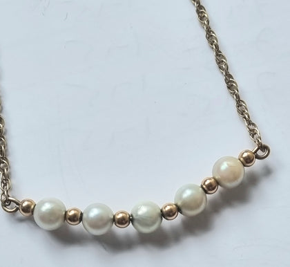 9ct Gold Necklace with run of pearls.