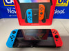 Switch Console, 64GB OLED + Neon Red/Blue Joy-Con