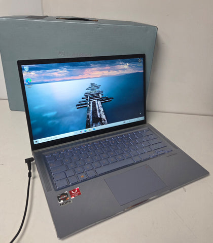 Asus ZenBook 14 UM431D Notebook,Silver Blue Metal, 8GB RAM,256GB HDD AMD R5-3500u,
