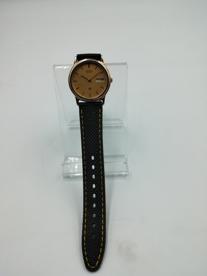 SEIKO QUARTZ 69176 GOLD FACE BLACK RUBBER STRAP