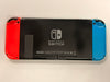 nintendo switch console red and blue joycons