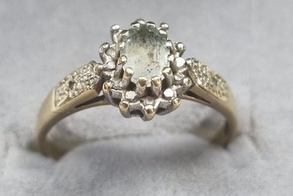 9ct Gold ring with stones.