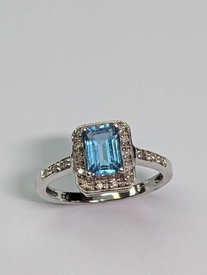 9CT WHITE GOLD DIAMOND & BLUE STONE RING