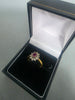 18ct GOLD RING WITH RED STONE 3.2G 750 Size K