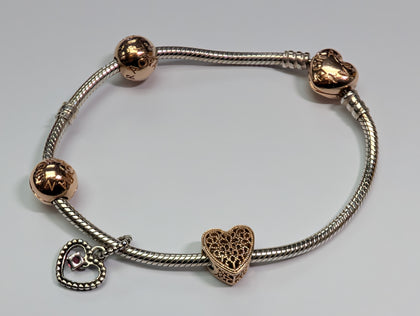 Pandora Charm bracelet With Rose Gold Charms