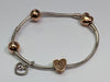 Pandora Charm bracelet With Rose Gold Charms