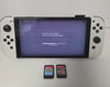 Nintendo Switch oled with 2 unboxed games