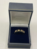 9ct Gold Ring With Black Stones - Q