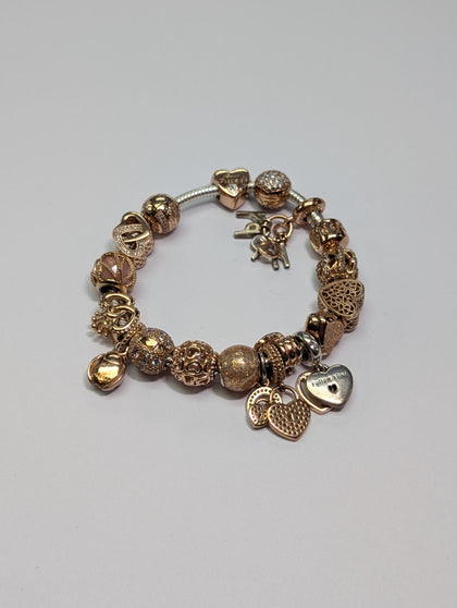 Pandora Bracelet With 17 Rose Gold Coloured Charms