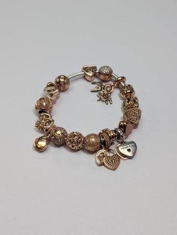Pandora Bracelet With 17 Rose Gold Coloured Charms