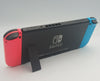 Nintendo Switch 32GB handheld console with red/blue joycons, dock and charger UNBOXED