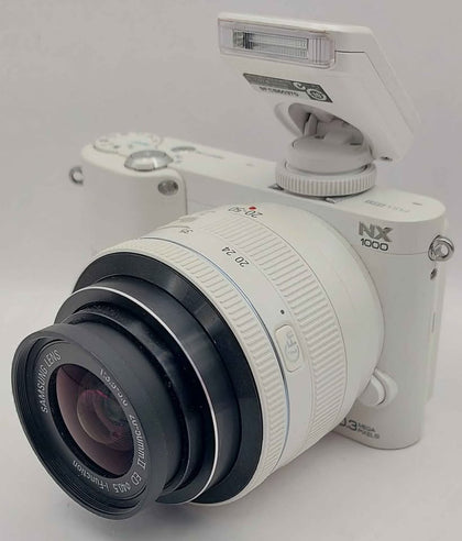 Samsung NX1000 20-50mm + 16mm wide with extra lenses and flash with charger Boxed white
