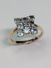 9ct Gold Ring with Turquoise Coloured Stones - Size N 1/2