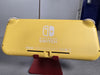 Nintendo Switch Lite Console, 32GB Yellow (Comeas With Mario Kart & Carry Case)