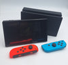 Nintendo switch 32GB handheld console with red/blue joy cons, dock and charger UNBOXED