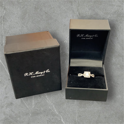 14ct Princess cut solitaire surrounded by brilliant cut diamonds size Q