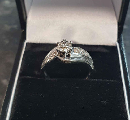 9ct White Gold and Diamond Ring - Size M.