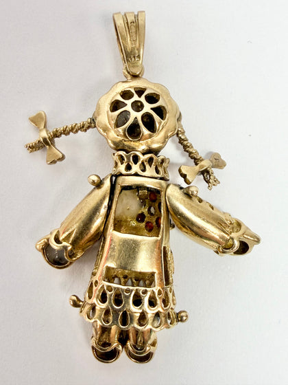 9ct yellow gold garnet stone doll pendant