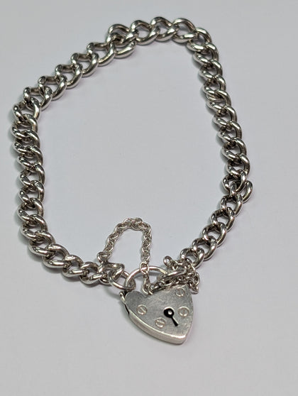 SILVER CHARM BRACELET WITH HEART LOCK