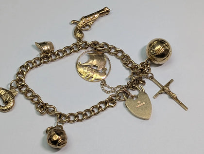9CT GOLD CHARM BRACELET
