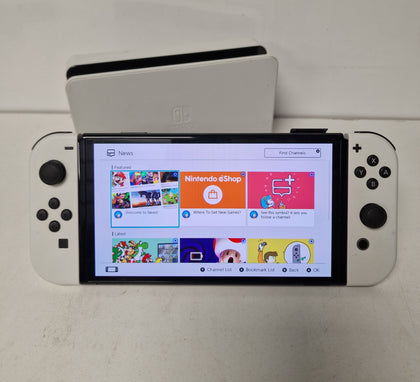 ** Sale ** Nintendo Switch OLED Model - White with Harry Potter Collection & Switch Sports Games.