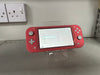 Switch Lite Coral Boxed Grade B + Case Unofficial Charger