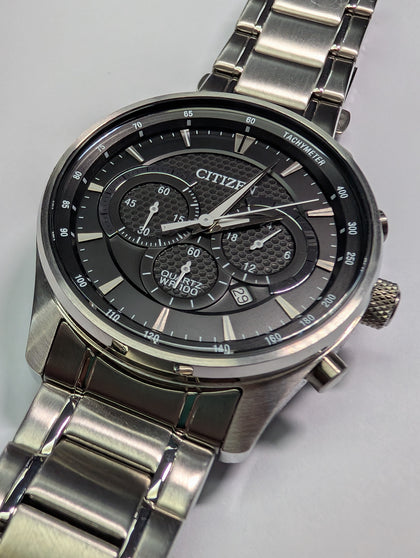 Citizen steel body watch with black face boxed