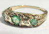 9ct Yellow five stoned half hoop ring with green stones size O
