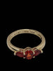 10ct Yellow Gold Ring With 3x Red Stones - Size J - 1.90 Grams