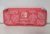 Nintendo Switch Lite Coral with unboxed Mario 8 Game