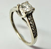 9ct White gold and diamond solitaire size N
