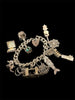 Solid silver charm bracelet with charms 72grams