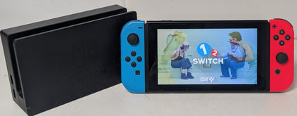 Nintendo Switch neon red/blue with 1 unboxed game