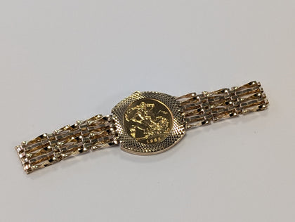 22ct Gold Half Sovereign 1982 on 9ct 5 bar gate bracelet.