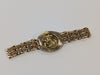 22ct Gold Half Sovereign 1982 on 9ct 5 bar gate bracelet.