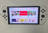 Nintendo Switch OLED Console - White & 1 Unboxed Game