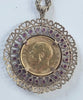 George V Sovereign in 9ct ruby mount with chain