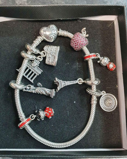 Pandora Bracelet with 8 Travel Based Charms..