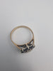 9CT Yellow gold fully hallmarked women's ring 2.85g size P with 8 black stones and cz center stone set