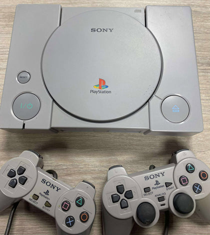 * PlayStation 1 with 2 controllers