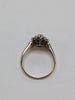 9CT GOLD RING WITH LILAC STONES